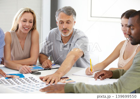 Creative, meeting and team planning with magazine, photoshoot and review of photography editing process. Office, people and talking about print, results and decision for production of paper catalog Creative, meeting and team planning with magazine, photoshoot and review of photography editing process. Office, people and talking about print, results and decision for production of paper catalog 139699550