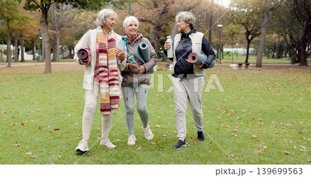 Senior friends, walking and talking with yoga mats in the park to relax in nature with elderly women in retirement. People, happy conversation and healthy outdoor exercise or pilates in winter Senior friends, walking and talking with yoga mats in the park to relax in nature with elderly women in retirement. People, happy conversation and healthy outdoor exercise or pilates in winter 139699563