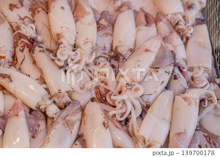 Fresh Squid on Crushed Ice Displayed at Traditional Seafood Market Stall 139700178