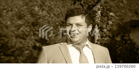 Smiling man in the park Smiling man in the park 139700260