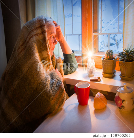 Poor old lady at the window 139700263