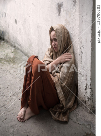 Frozen girl sitting on the floor 139700283