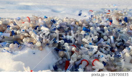 Used Blood Transfusion Scattered On A Snow 139700835