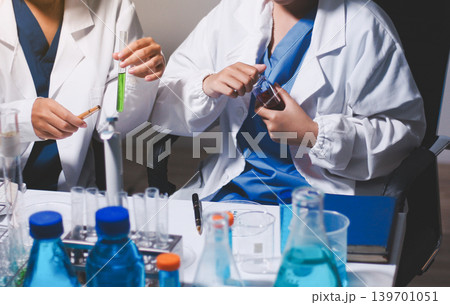Researchers working in the clinical laboratory Researchers working in the clinical laboratory 139701051