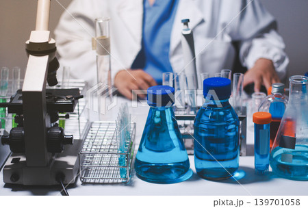 Researchers working in the clinical laboratory Researchers working in the clinical laboratory 139701058