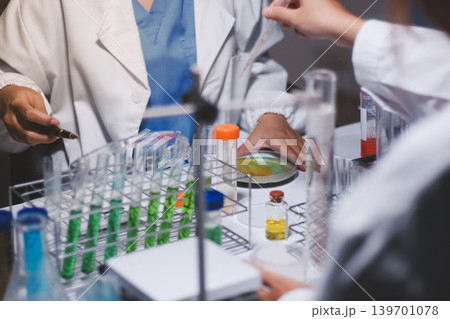 Researchers working in the clinical laboratory 139701078