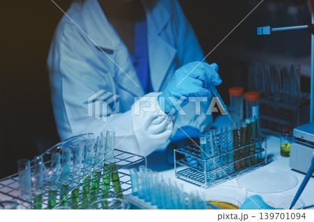 Researchers working in the clinical laboratory 139701094