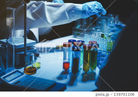 Researchers working in the clinical laboratory Researchers working in the clinical laboratory 139701106