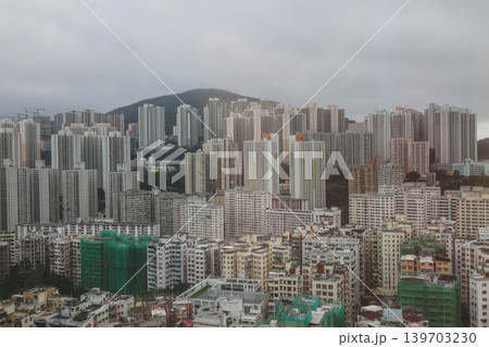 May 16 2026 Kwun Tong skyline dense residential towers under cloudy sky May 16 2026 Kwun Tong skyline dense residential towers under cloudy sky 139703230