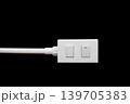 Close-up White Switch And  Plug isolated on black background with copy space 139705383