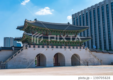 Seoul, South Korea - May. 14, 2026 : Historical Gwanghwamun Gate surrounded by modern skyscrapers and Bugaksan Mountain in Seoul, South Korea 139705828