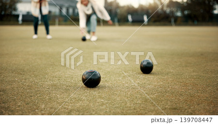 Women, park or old people bowling for fitness, training or exercise for wellness or teamwork outdoors. Senior ladies, relax or elderly friends playing fun ball game or sport in workout together Women, park or old people bowling for fitness, training or exercise for wellness or teamwork outdoors. Senior ladies, relax or elderly friends playing fun ball game or sport in workout together 139708447
