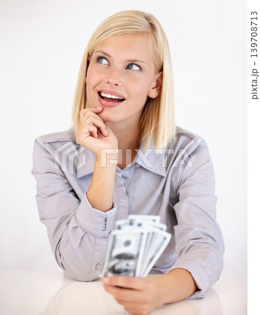 Thinking, woman and money with financial idea, investment and savings for budget with reward. Wealth, wondering and happy person with cash profit from work bonus in studio with white background 139708713