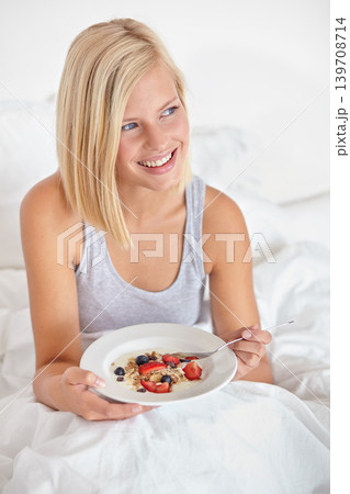 Woman, smile and breakfast in bedroom, hotel and wake up for morning hospitality or accommodation. Relax, food and holiday with happy young person in bed of home, weekend and comfortable with cereal Woman, smile and breakfast in bedroom, hotel and wake up for morning hospitality or accommodation. Relax, food and holiday with happy young person in bed of home, weekend and comfortable with cereal 139708714