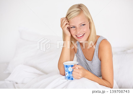 Happy woman, thinking and relax in bed with coffee and wake up with ideas for morning for future. Healthy, person and girl with tea in bedroom on holiday, vacation or wellness from rest in apartment 139708743