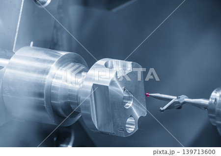 High-precision quality control of aluminum parts on a CNC lathe machine using a CMM touch probe in a blue-toned scene. 139713600