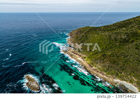 Rocky coastline at Cape Hawke in Forster 139714422