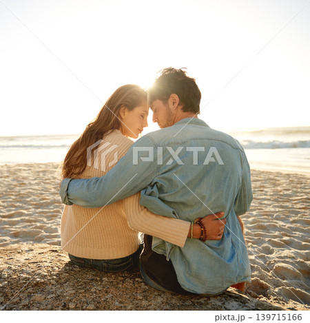 Beach sunset, hug and couple relax with love, support and relationship security on summer holiday in Greece. Embrace, forehead touch and back of marriage partner, soulmate or people bonding on date Beach sunset, hug and couple relax with love, support and relationship security on summer holiday in Greece. Embrace, forehead touch and back of marriage partner, soulmate or people bonding on date 139715166