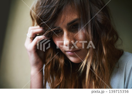 Woman, face and thinking with headache in mistake, stress or burnout on wall background at home. Closeup of young female person in mental health, anxiety or depression with insomnia in lonely house Woman, face and thinking with headache in mistake, stress or burnout on wall background at home. Closeup of young female person in mental health, anxiety or depression with insomnia in lonely house 139715356