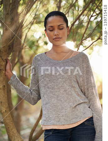 Woman, tree and eyes closed for peace in forest, travel and think about life, mindfulness and sun. Nature park in Brazil, calm outdoor for zen and dream in environment with tranquility and fresh air Woman, tree and eyes closed for peace in forest, travel and think about life, mindfulness and sun. Nature park in Brazil, calm outdoor for zen and dream in environment with tranquility and fresh air 139715418