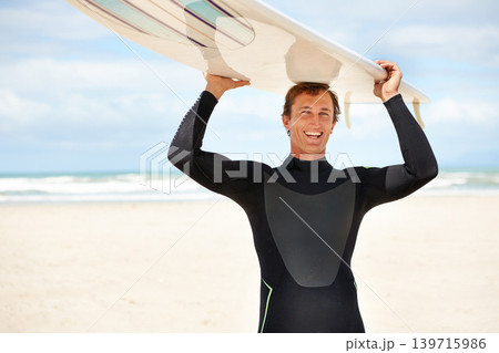 Surfer, happy man with surfboard and beach for waves, ocean and travel, extreme sports and athlete outdoor. Fitness, wellness and summer vacation, nature and surfing on tropical island in Australia Surfer, happy man with surfboard and beach for waves, ocean and travel, extreme sports and athlete outdoor. Fitness, wellness and summer vacation, nature and surfing on tropical island in Australia 139715986