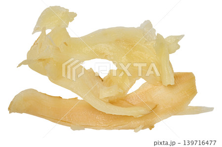 Thin slices of pickled ginger on isolated background, traditional spicy snack Thin slices of pickled ginger on isolated background, traditional spicy snack 139716477
