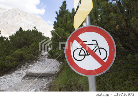 Sign: No passage for bicycles in the mountains Sign: No passage for bicycles in the mountains 139716972