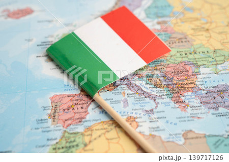 Bangkok, Thailand December 10, 2023 Italy map in world map paper. Bangkok, Thailand December 10, 2023 Italy map in world map paper. 139717126