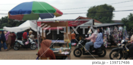 The atmosphere of a traditional market with traders and motorcyclists mingling. The atmosphere of a traditional market with traders and motorcyclists mingling. 139717486