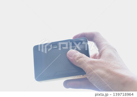 hand photo shooting with manual compact film camera of bright sky background and texture 139718964