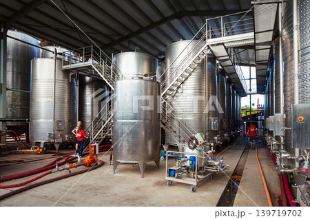 Stainless steel storage tanks with wine 139719702