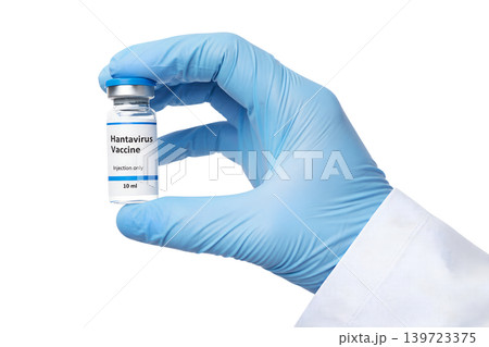 Single gloved hand holding a small glass vial of hantavirus vaccine with a rubber stopper and aluminum seal, representing immunization against hemorrhagic fever with renal syndrome or hps 139723375