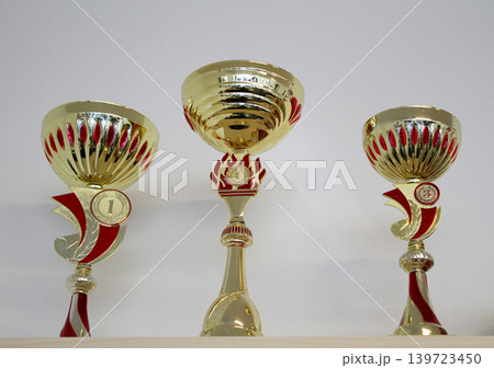 Sports cups for first and third place for winners  139723450