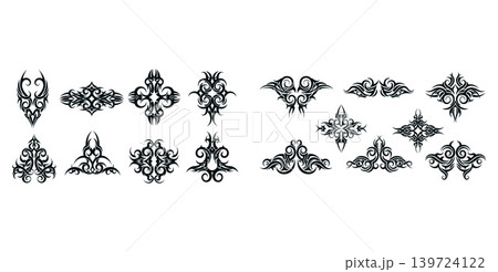Assortment of intricate tribal vector elements with diverse forms including wings, crosses, and bold ornamental swirls 139724122