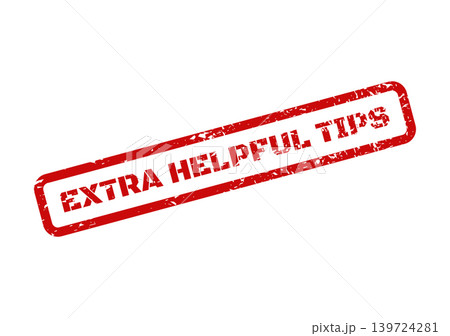 A distressed red rubber stamp with the phrase Extra Helpful Tips for instructional purposes A distressed red rubber stamp with the phrase Extra Helpful Tips for instructional purposes 139724281