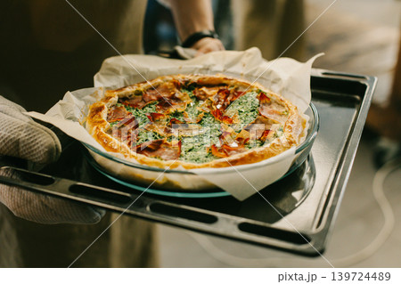 Traditional Italian pie before baking in a kitchen. Traditional Italian pie before baking in a kitchen. 139724489