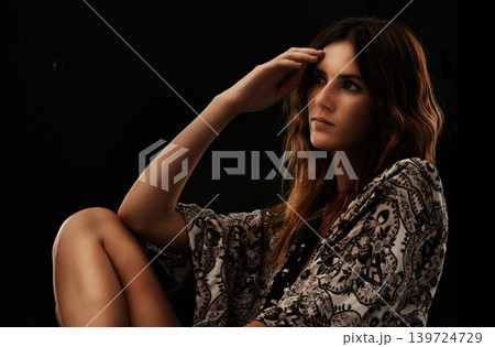 Attractive woman, fashion and hair in natural beauty, wonder or relaxing on a dark studio background. Gorgeous young female person or model thinking, idea or dream for ambition on mockup space Attractive woman, fashion and hair in natural beauty, wonder or relaxing on a dark studio background. Gorgeous young female person or model thinking, idea or dream for ambition on mockup space 139724729