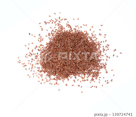 pile of flax seeds isolated on white 139724741