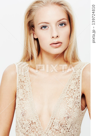 Portrait, woman and pride in lingerie in studio, confident and feminine fashion with body care. Young model, face and cosmetics in underwear for skincare, blonde hair and make up by white background Portrait, woman and pride in lingerie in studio, confident and feminine fashion with body care. Young model, face and cosmetics in underwear for skincare, blonde hair and make up by white background 139724810