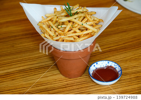 Crispy Golden French Fries Fast Food Snack Close Up Crispy Golden French Fries Fast Food Snack Close Up 139724988