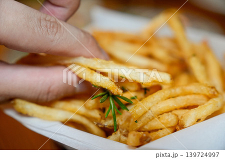 Crispy Golden French Fries Fast Food Snack Close Up Crispy Golden French Fries Fast Food Snack Close Up 139724997