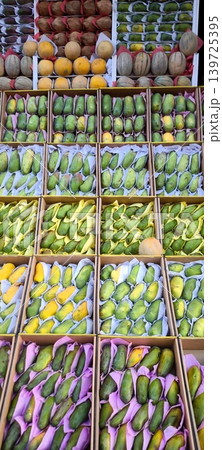 Abundance of mangoes and other exotic fruits at the market Abundance of mangoes and other exotic fruits at the market 139725395