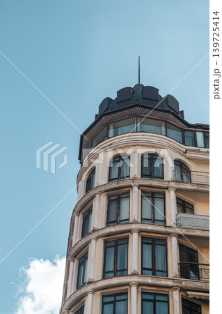 Round building facade with vintage style on sky 139725414
