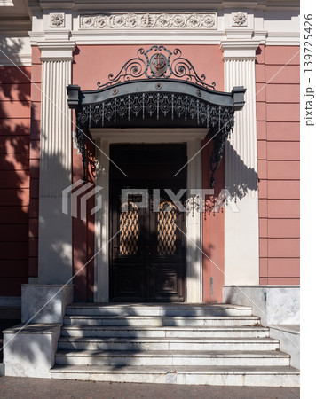 Ornate Building Entrance With Iron Canopy 139725426
