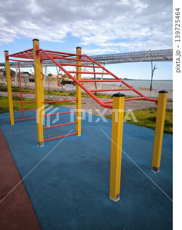 A vibrant outdoor sports ground for workout on the lakeshore A vibrant outdoor sports ground for workout on the lakeshore 139725464