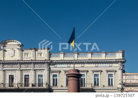 Ukraine Flag in Odesa Flying Against Blue Sky 139725507