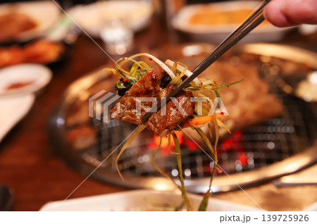Delicious Traditional Korean Marinated Pork Ribs Barbecue Grilling Delicious Traditional Korean Marinated Pork Ribs Barbecue Grilling 139725926