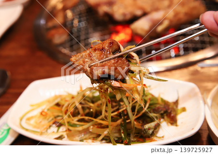 Delicious Traditional Korean Marinated Pork Ribs Barbecue Grilling Delicious Traditional Korean Marinated Pork Ribs Barbecue Grilling 139725927