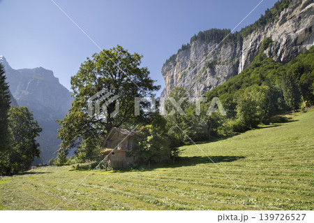 Lauterbrunnen valley swiss alps cabin mountain landscape Lauterbrunnen valley swiss alps cabin mountain landscape 139726527