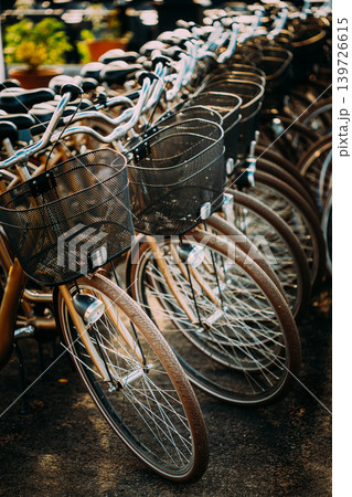 Rows of Bicycles Parked .Row of city parked bicycles bikes for rent on sidewalk in European City Stockholm, Sweden 139726615